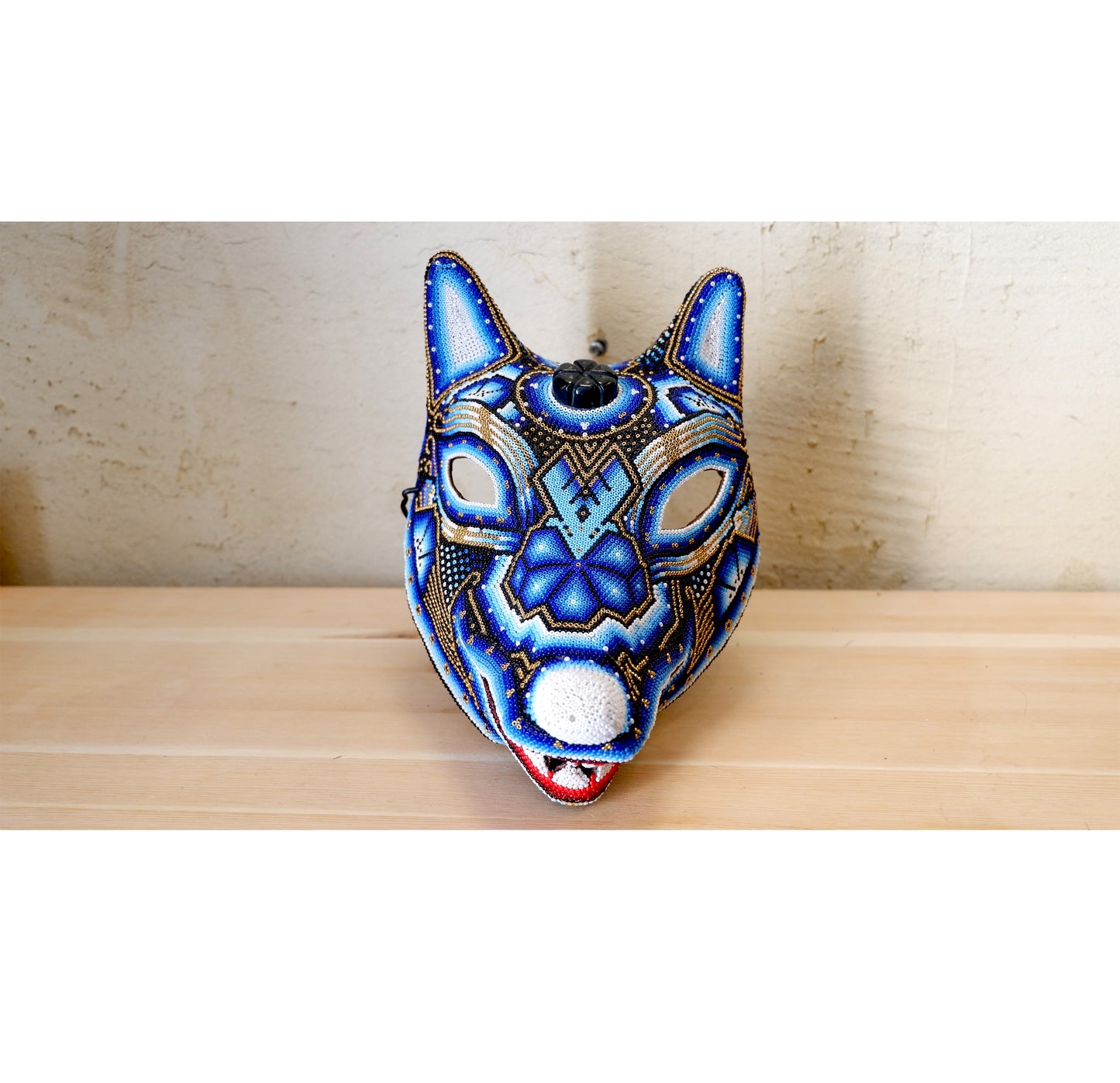 Maska koralikowa Wixaritari (Huichol)